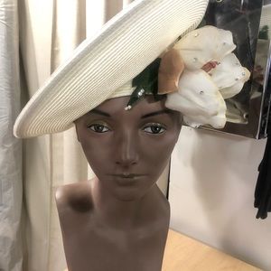 George Zamau’L white hat with flowers & rhinestones.
